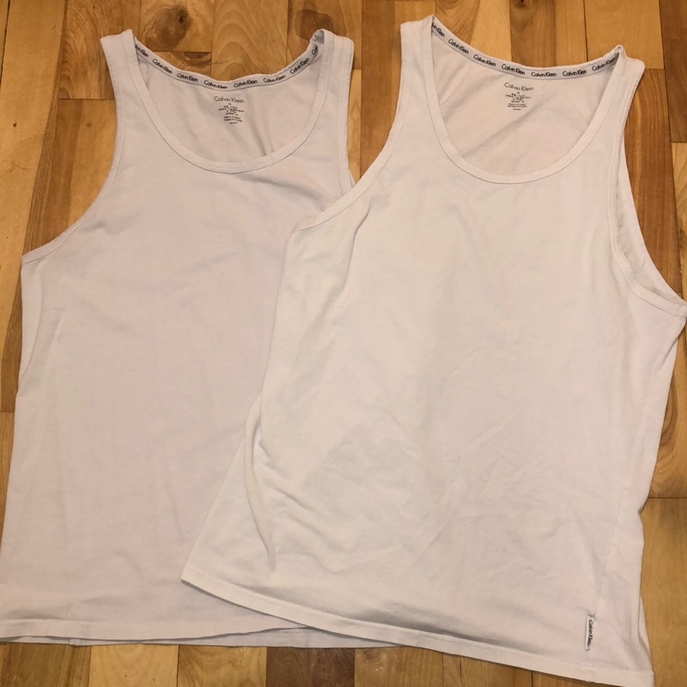 2 Calvin Klein tanks.